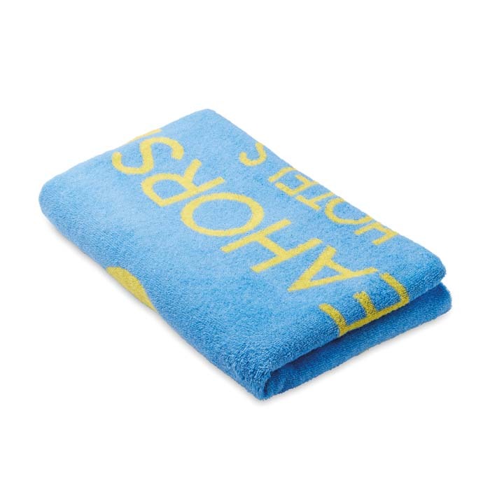 Serviette de plage tissée bicolore