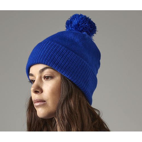Bonnet avec pompon et intérieur polaire