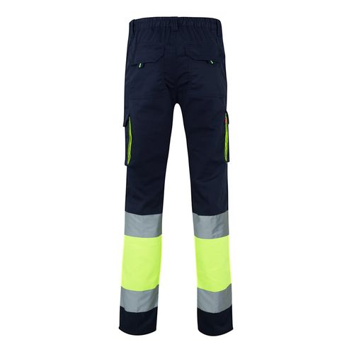 azul marino/amarillo VL ZEUS. Pantalón elástico multibolsillos bicolor (240 g/m²), en algodón (46 %), EME (38 %) y poliéster (16 %)
