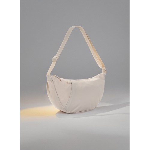 beis Bolsa bandolera de media luna Crescent XL AWARE™ RPET