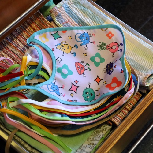 BABERO IMPERMEABLE PEQUEÑO PERSONALIZABLE